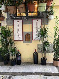 Osteria-Belle-Donne-wine-bottles-outside-window-Florence