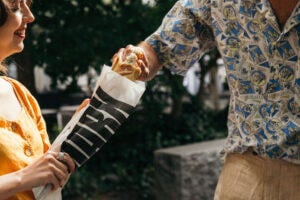 people_sharing_a_baguette