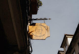 sign_hanging_outside_Mercearia_do_Pai_Júlio