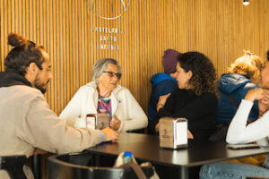people_chatting_inside_pastelaria_santo_antonio_lisbon