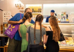 people_on_a_food_tour_ordering_ice_cream
