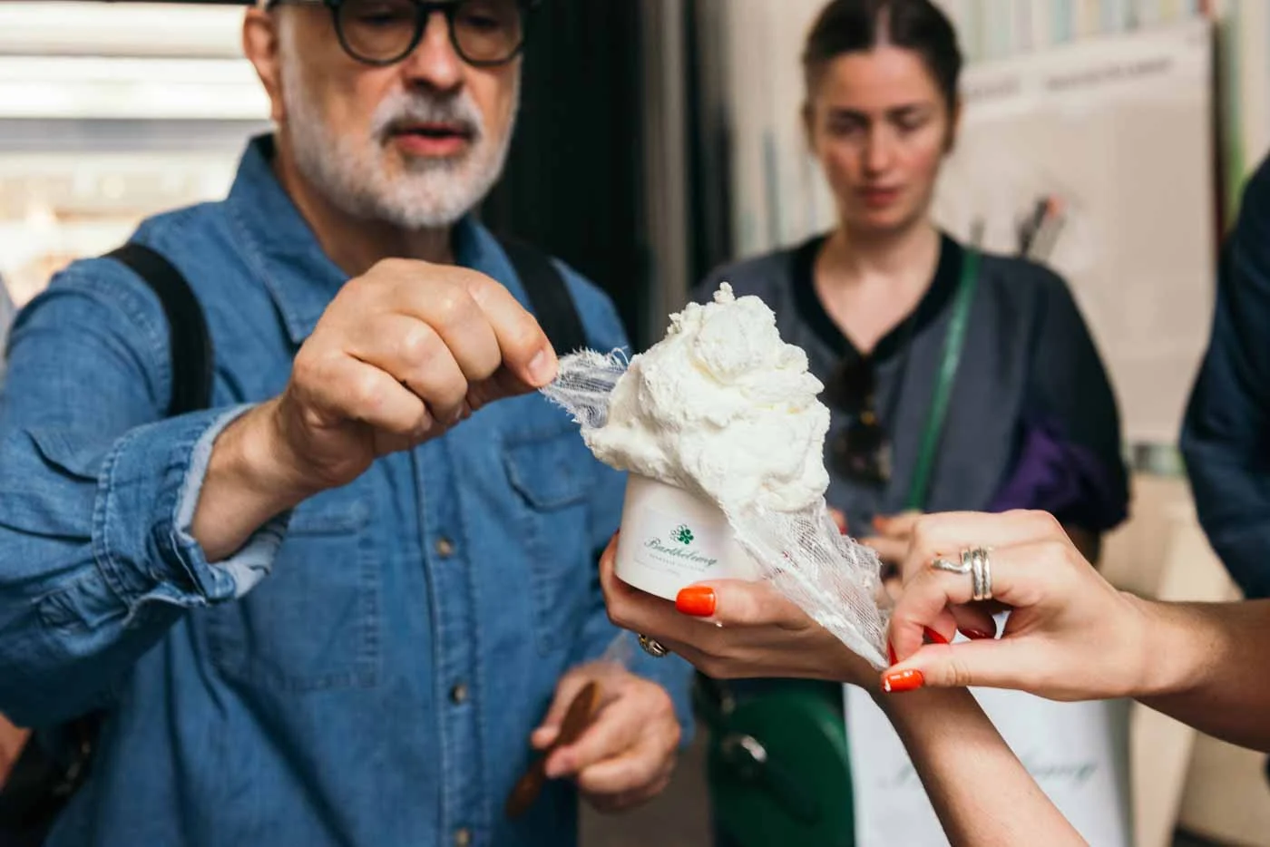 group_eating_cheese_at_Fromagerie_Barthélemy_Paris