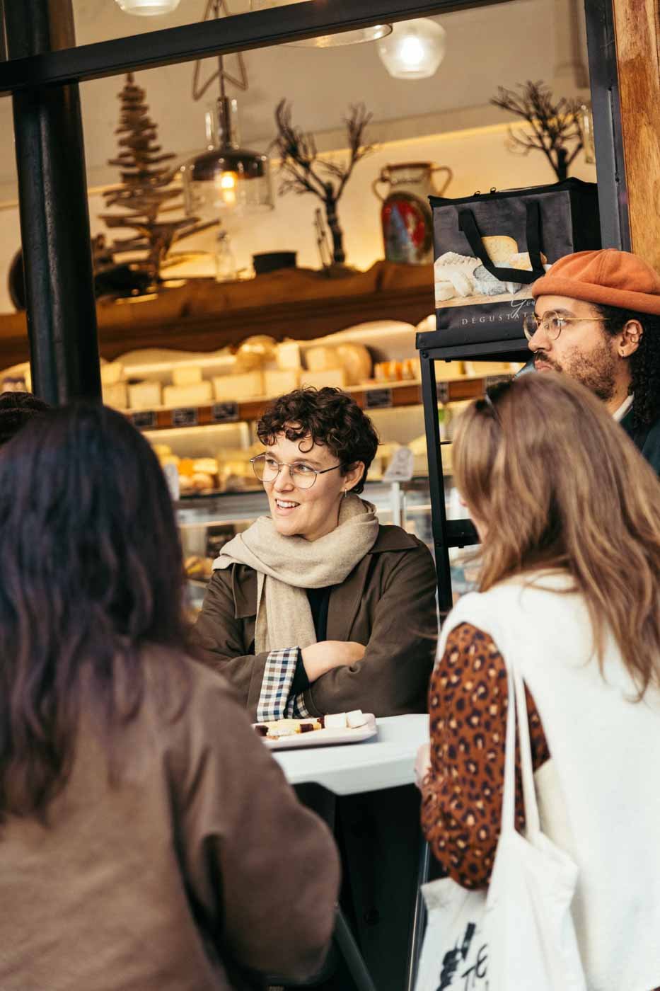 Eating_Europe_tour_group_chatting_outside_Fromagerie_Jouannault_Paris